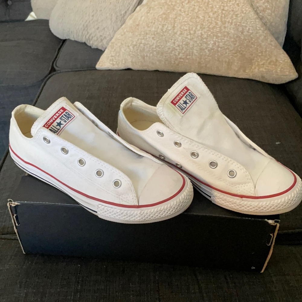 Worn youth size 3 low top converses.